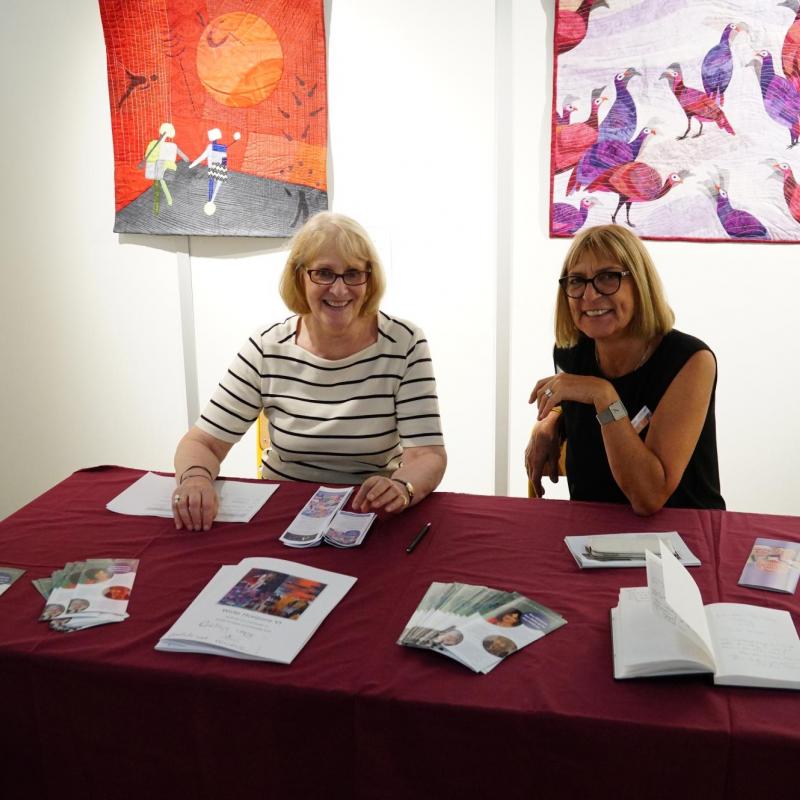 Volunteers at the SAQA booth at European Patchwork Meeting (France)